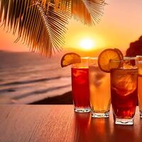 drinks with blur beach and sunset in background. concept of leisure, holiday, relaxation photo