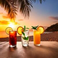 drinks with blur beach and sunset in background. concept of leisure, holiday, relaxation photo