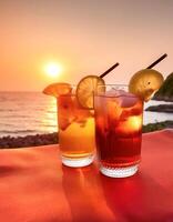 drinks with blur beach and sunset in background. concept of leisure, holiday, relaxation photo
