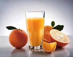 Glass of Orange juice with orange sacs and slices fruits isolate on white background photo