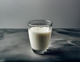 Glass of milk on white background photo