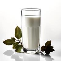 Glass of milk on white background photo