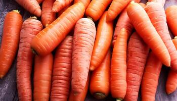 Organic carrots, ripe and fresh. In full frame capture fresh carrots. photo
