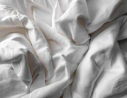 Background concept. Blankets that are still wrinkled have been used. The white blanket is crumpled and shabby. Pattern texture background photo