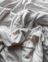 Background concept. Blankets that are still wrinkled have been used. The white blanket is crumpled and shabby. Pattern texture background photo