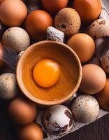 photo pallet with eggs and raw broken egg with yolk. Pattern texture background