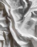 Background concept. Soft bed sheets that are still wrinkled after being used. The white bed sheets were crumpled and shabby. Pattern texture background. photo