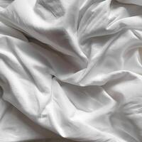 Background concept. Soft bed sheets that are still wrinkled after being used. The white bed sheets were crumpled and shabby. Pattern texture background. photo