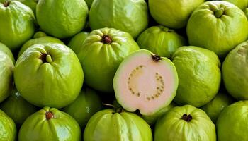 a pile of close-up guava fruit fresh, organic. photo