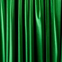 captures the luxurious texture of velvet curtains in a green hue, creating a soothing and elegant abstract background photo