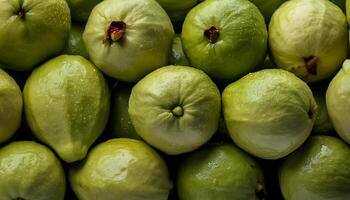 a pile of close-up guava fruit fresh, organic. photo