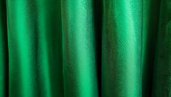captures the luxurious texture of velvet curtains in a green hue, creating a soothing and elegant abstract background photo