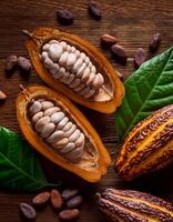 Photo of Cocoa Beans and Cocoa Fruits on wooden, Cocoa concept.