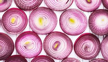 red onion slices. pattern texture background. photo