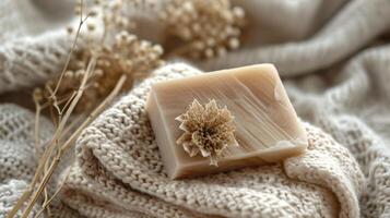 Soap Bar Resting on Blue Blanket photo