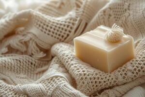 Soap Bar Resting on White Blanket photo
