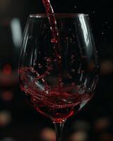 Red Wine Poured Into a Glass photo