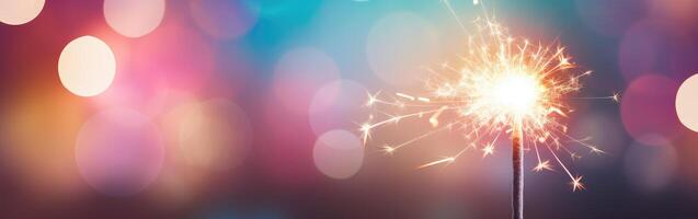 Close-Up Sparkler With Blurry Lights photo