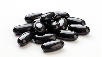 Stack of Black Pills on White Table photo