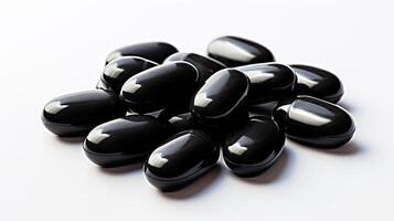 Stack of Black Pills on White Table photo