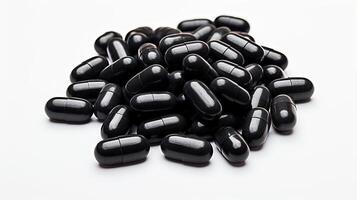 Stack of Black Pills on White Surface photo
