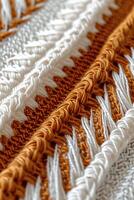 Close-Up of Orange and White Blanket photo