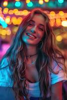 Woman Smiling Under Colorful Lights photo