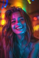 Woman Smiling in Neon Lights photo