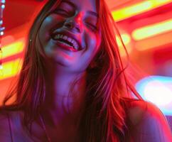 Woman Laughing in Neon Light photo