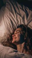 Woman Sleeping Happily in Bed photo