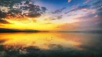 The Calm Sea and Cloudy Sky in the Afternoon Sunset Light photo