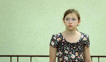 Young Cute Little Blond Girl Portrait with Reading Glasses photo