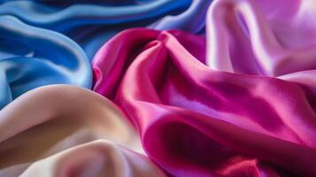 Flowing waves of fabric, gently undulating and rippling, with a soft, silk-like texture background photo
