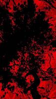 Vertical - gritty red and black textured grunge background with exploding paint or ink splatters. Full HD and looping messy grungy abstract background. video