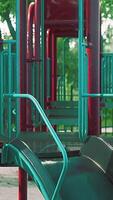 Empty colorful children playground set in park video