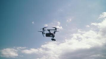 drone with a camera in the air on the set of a movie. drone with a camera. filming in the desert video