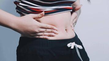 Overweight, woman touching fat belly, healthy diet and calorie control. video
