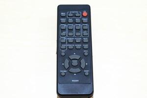 Selective focus on remote control isolated on white background photo