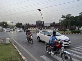 low angle view of city traffic in Lahore, Pakistan on June 3, 2024. photo