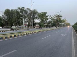 low angle view of city traffic in Lahore, Pakistan on June 3, 2024. photo