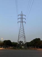 Transmission Lines and tower for transmitting electricity in Lahore, Pakistan on June 4, 2024. photo
