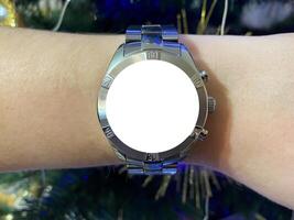 A view of the quartz watch dial with a stainless steel strap on the arm with a mockup photo