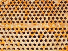 Shell-and-tube heat exchanger for heat exchange between two streams close-up. Dirty pipes in the opened heat exchanger photo