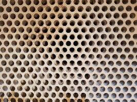 Shell-and-tube heat exchanger for heat exchange between two streams close-up. Dirty pipes in the opened heat exchanger photo