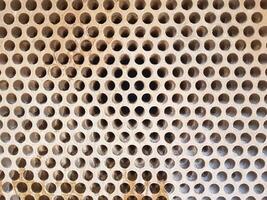 Shell-and-tube heat exchanger for heat exchange between two streams close-up. Dirty pipes in the opened heat exchanger photo
