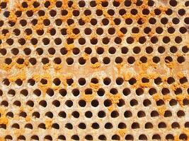 Shell-and-tube heat exchanger for heat exchange between two streams close-up. Dirty pipes in the opened heat exchanger photo