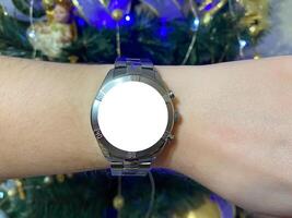 A view of the quartz watch dial with a stainless steel strap on the arm with a mockup photo