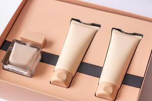 Close-up of a set of perfumed water, cream-colored shower gel in a gift box . Close-up photo on a white background