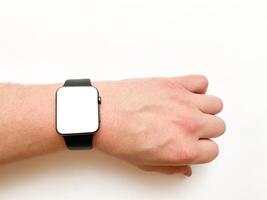 View of the smart watch screen on your hand with mockup on a white isolated background photo