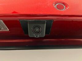 Rear view camera with washer installed on the car photo